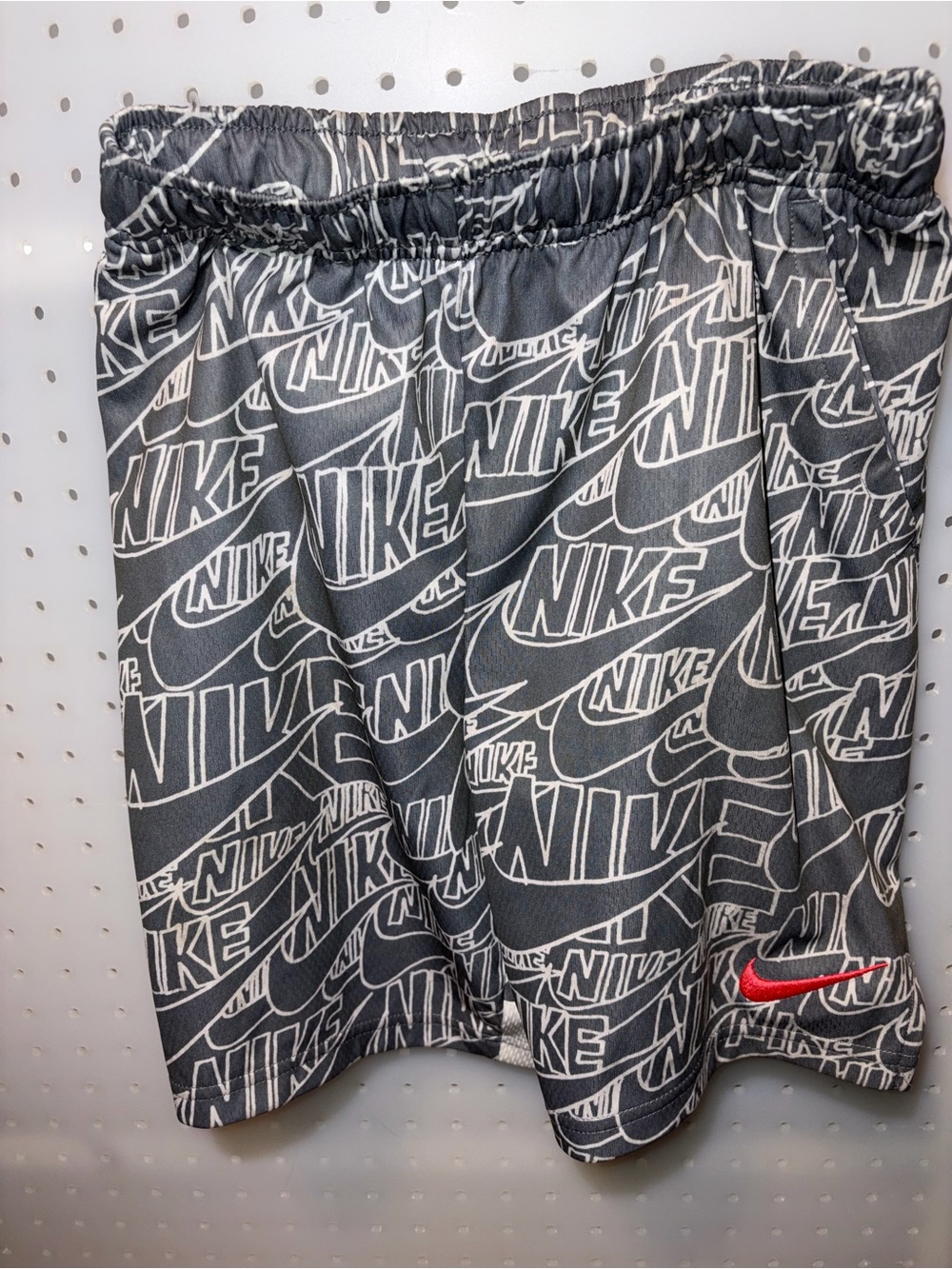 Nike Black Allover Logo Shorts with Red Swoosh